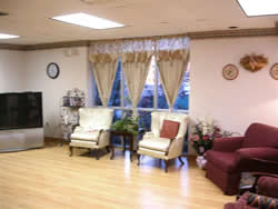 Community room with chairs and TV